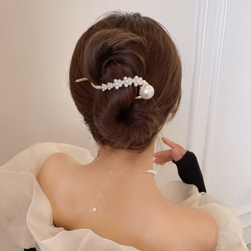 Elegante und einfache Perlenhaarspange