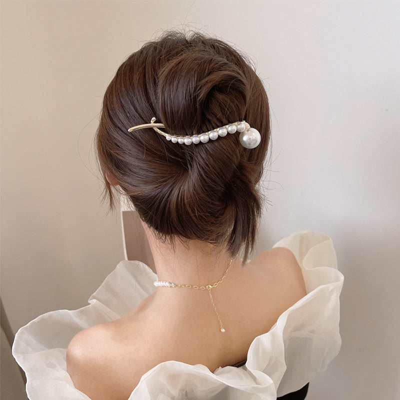 Elegante und einfache Perlenhaarspange