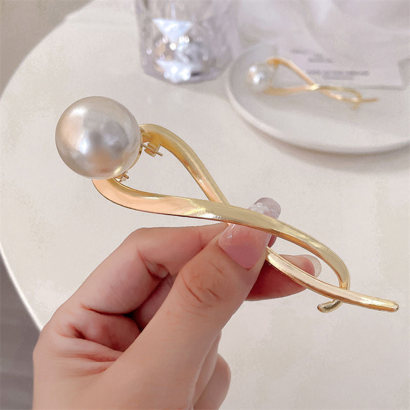Elegante und einfache Perlenhaarspange