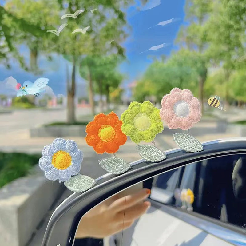 Niedliche Wackelkopfblumen-Autodekoration